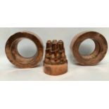 A spiral turreted copper jelly mould by Benham & Froud with trademark orb and cross above number