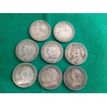 Eight silver GB crowns in, generally, about fine to about very fine condition. The coins, all