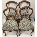 A set of four Victorian balloon back chairs with foliate carved crest and cross rails, in blue