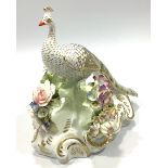 A Royal Crown Derby figure, 'Albert Gregory Low Peacock', with printed marks to base and signed in
