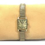 A ladies 18ct gold cased International Watch Company automatic wristwatch, the square gold dial with