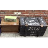 A black painted wooden crate, with white painted writing, '682169 J/T Jones. D. R. R.A.F JON 1-1',