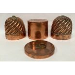 A pair of spiral copper jelly moulds marked 'Jones Bros 4 Down St. W', 12 x 11.5cm wide, together