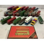 A collection of 23 model buses from various makers, including a Corgi East Lancs, an Alexander