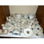 A large quantity of Goss crested china, all Portsmouth and Southsea, including a Suitcase, house,