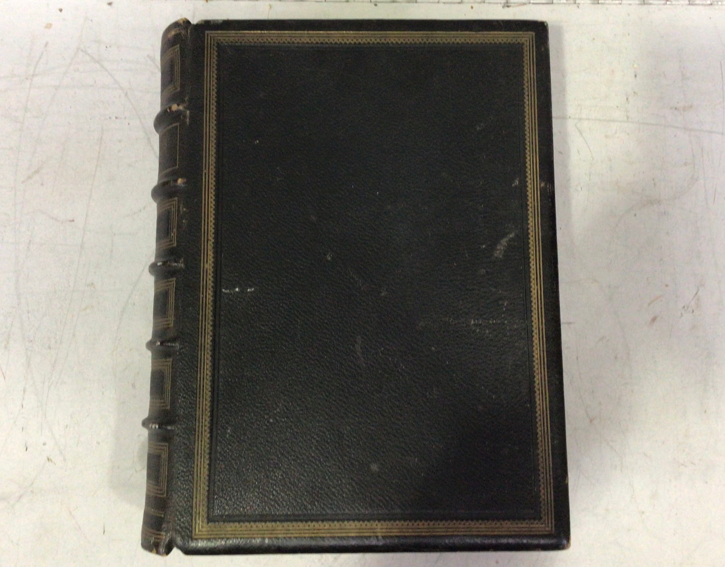 A large black leather bound 'Comprehensive Family Bible,' with raised banded spine, gilt-tooled - Image 2 of 3