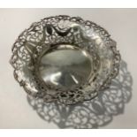 A George V silver bread basket by Mappin & Webb, of circular form, with cast and applied shell-