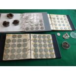 Three folders containing British coins ' halfcrowns, florins, 11 large 10ps with different dates,