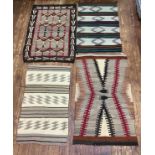 Four various late 19th / early 20th century hand knotted Navajo blankets / rugs with various