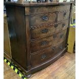 A large 19th century walnut bow fronted chest of drawers, two short over 3 long, with a concealed