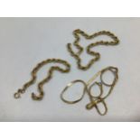 A small collection of assorted 9ct gold jewellery items comprising a broken rope twist chain and