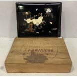 A Japanese Shibayama lacquered photo album with scenes of red-crowned cranes amidst flowers,