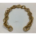 A 9ct gold bracelet formed as textured triple circular links, (af), 6.3g