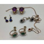 A pair of 14ct gold and amethyst earrings with clip backs, 7.4g, together with three pairs of 9ct