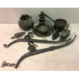 A quantity of cast iron cookwares including two open fire hangers with trammels, cauldron with
