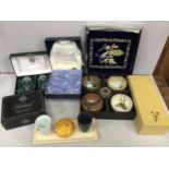 Two boxed sets of Chinese pottery bowls and serving plates, together with three boxed sets of