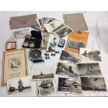 A collection of Falkland Island ephemera and militaria including Graf Spee postcards, crested