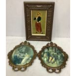 A pair of convex glazed prints in gilt embossed oval frames, together with a print of a young piper,