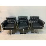 Three black vinyl hair stylists chairs with diamante studded backs and foot-pedal height adjustment,