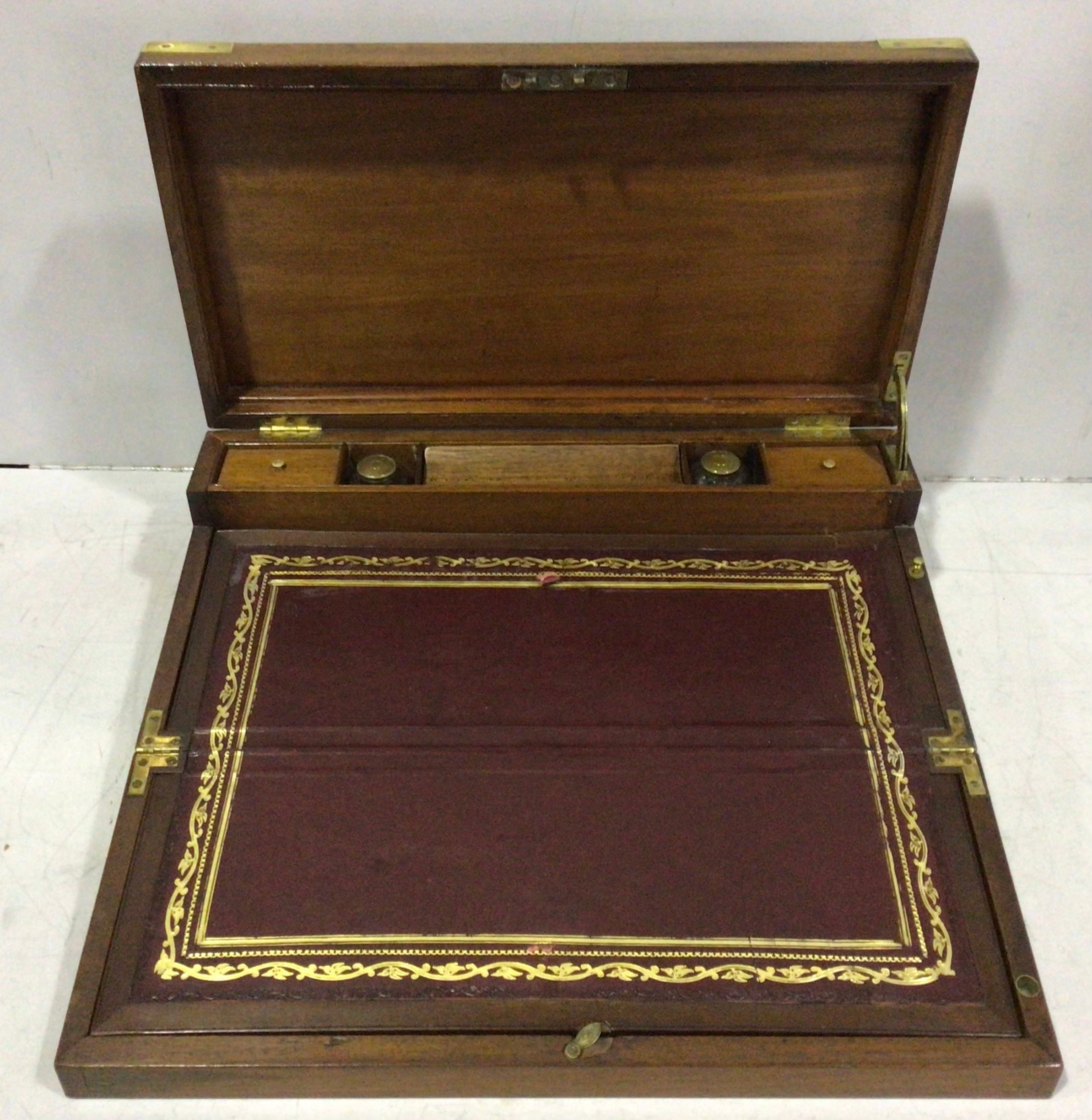 A Regency Campaign-style brass-bound mahogany 'Tompson Patent' writing slope, the hinged rectangular