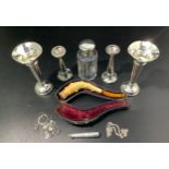 Two various pairs of small silver posy vases with wavy rims, together with a silver and amber