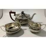 A three-piece Regency 'style' silver tea set, comprising teapot, cream jug and sugar bowl, all of