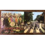 Two rare 12" vinyl LPs from The Beatles, "Abbey Road" (PCS 7088, Mfd. UK) and "Sgt. Pepper's