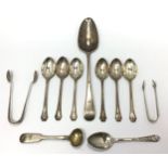 A George III silver spoon, hallmarked London, 1805 and two various pairs of silver sugar tongs,
