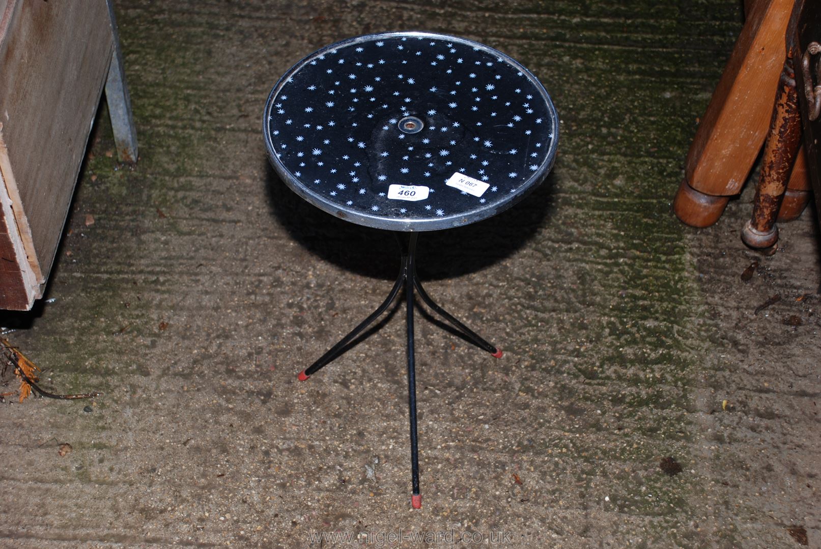 A circular occasional table 12" diameter x 18" .