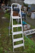 A four rung step ladder.
