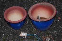 Two blue glazed round garden planters