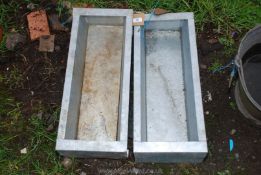 Two galvanised feeders,