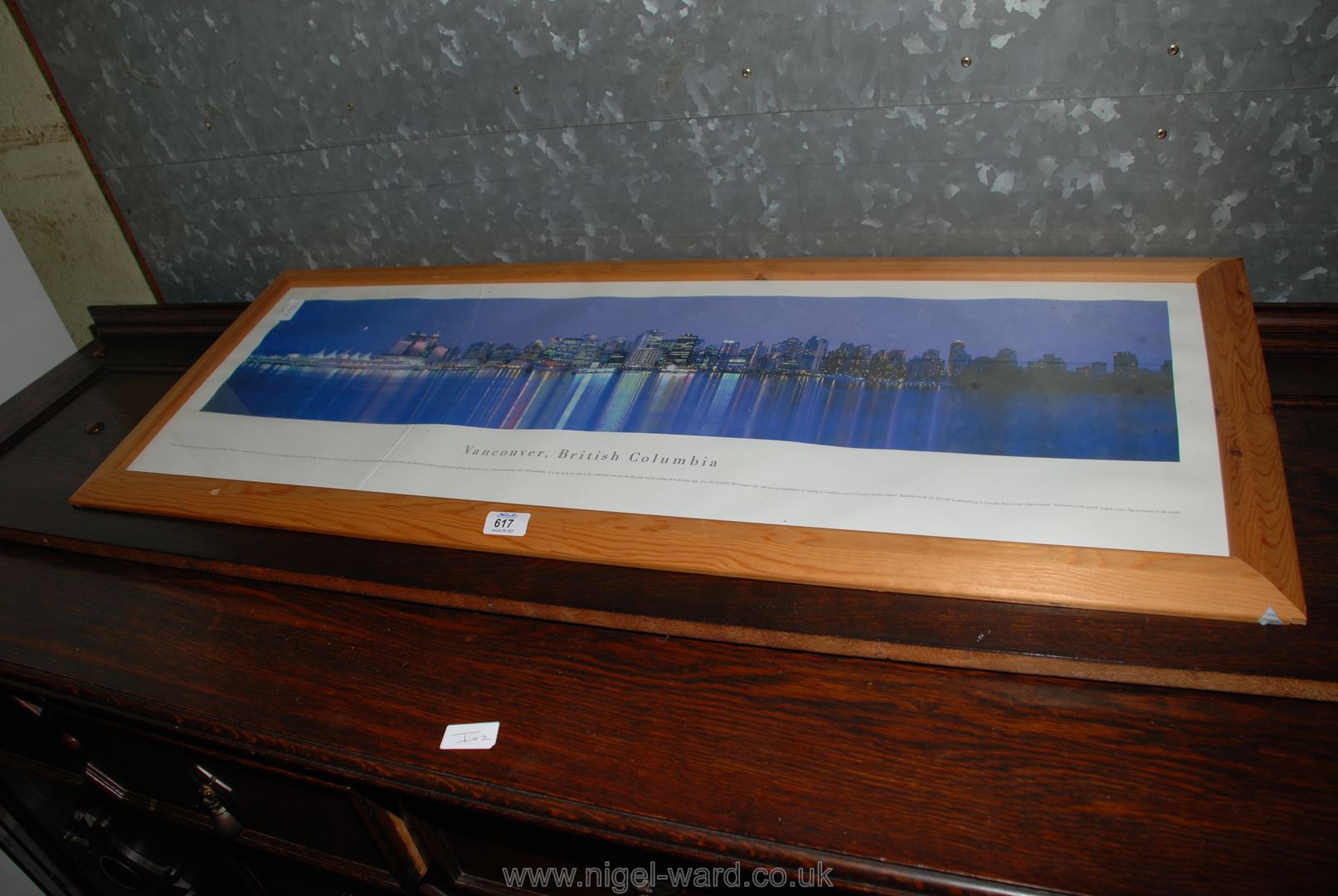 A framed and glazed picture of Vancouver, British Columbia, a/f.