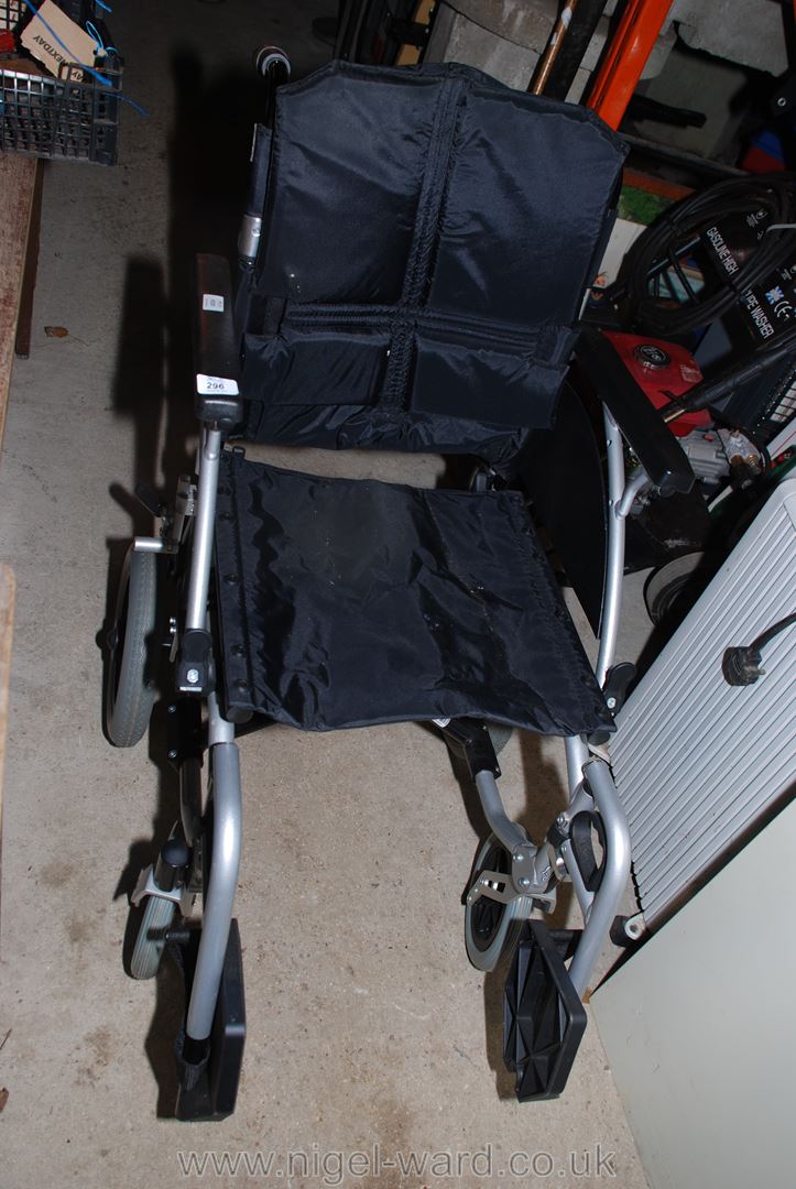 A folding wheelchair.