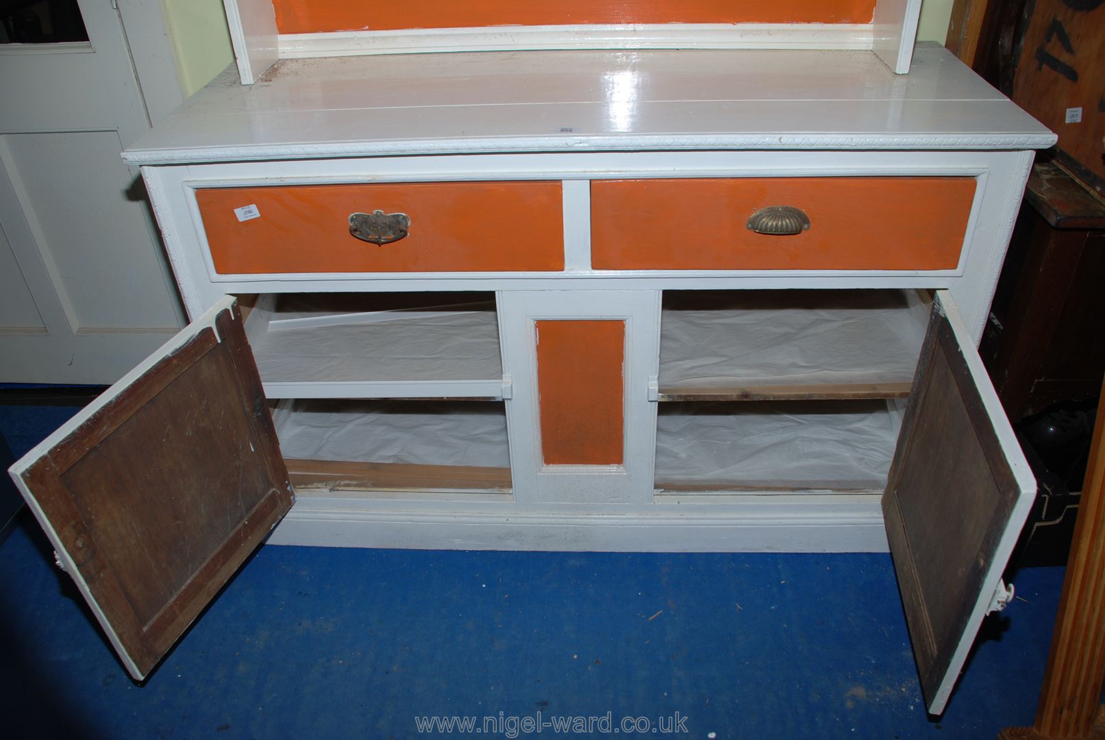 A striking white and orange painted dresser, 53" x 19 1/2" x 68" high. - Image 2 of 2