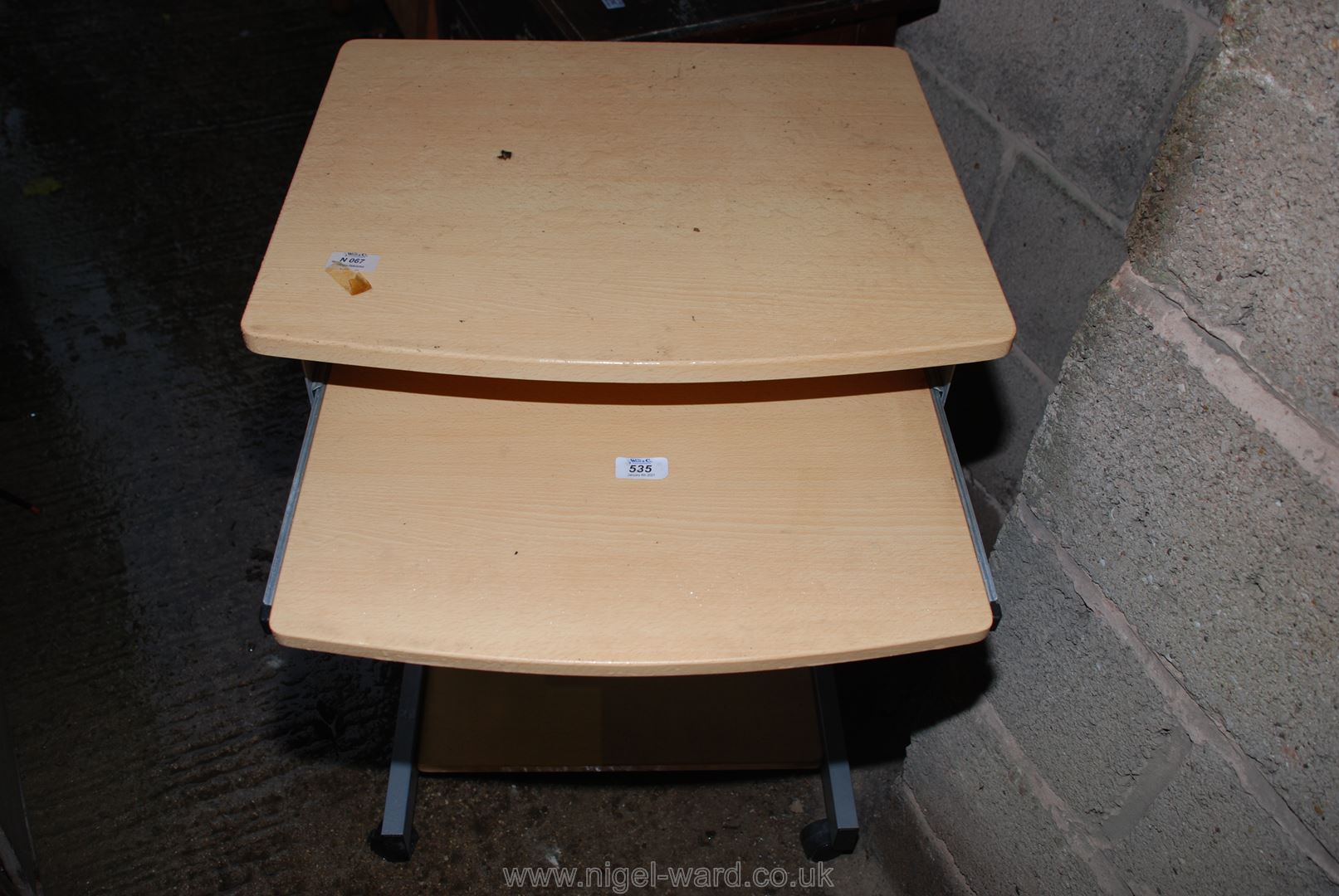 A light Oak effect computer desk.