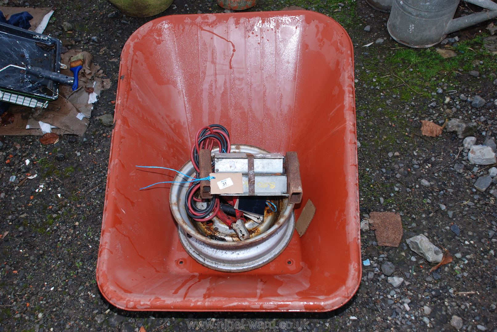 Wheelbarrow skip - plastic wheel rim jump lead, etc.