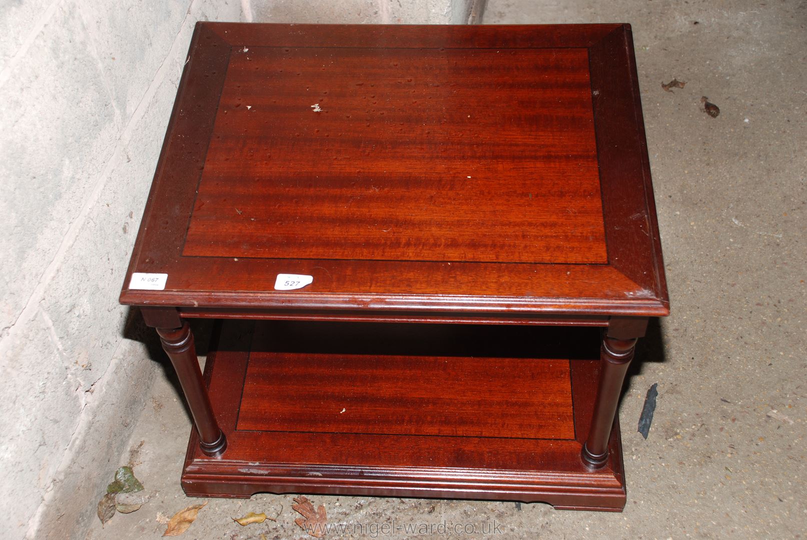 A square wooden T.V. table 23" x 23" x 17" tall.