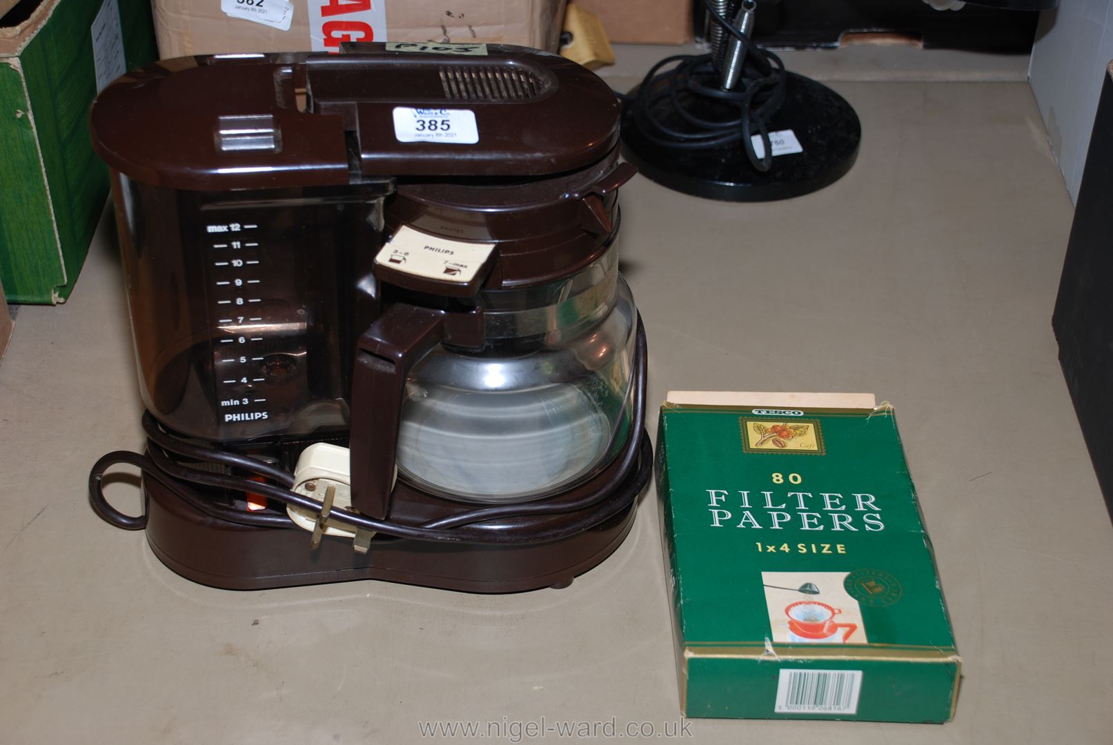 A "Phillips" coffee machine and paper filters.