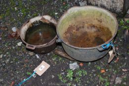 Two cast pots