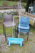 Garden spreader, three stacking chairs and high stool.