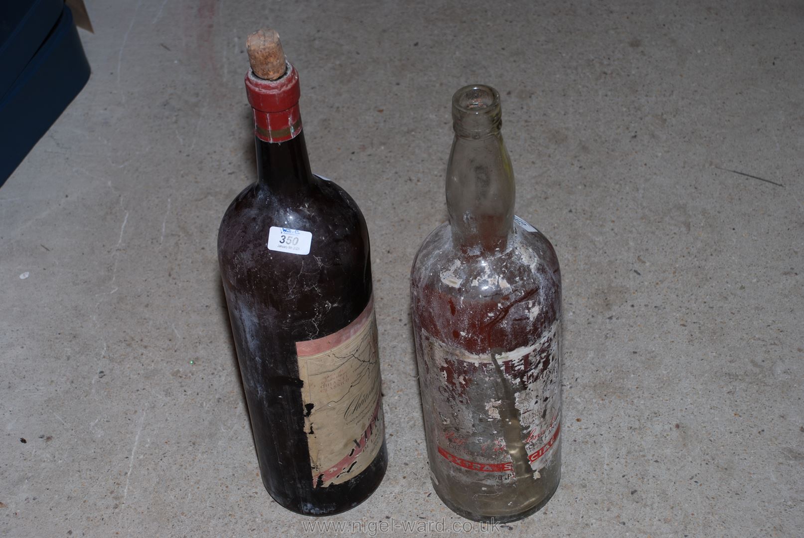 Two one gallon spirit bottles.