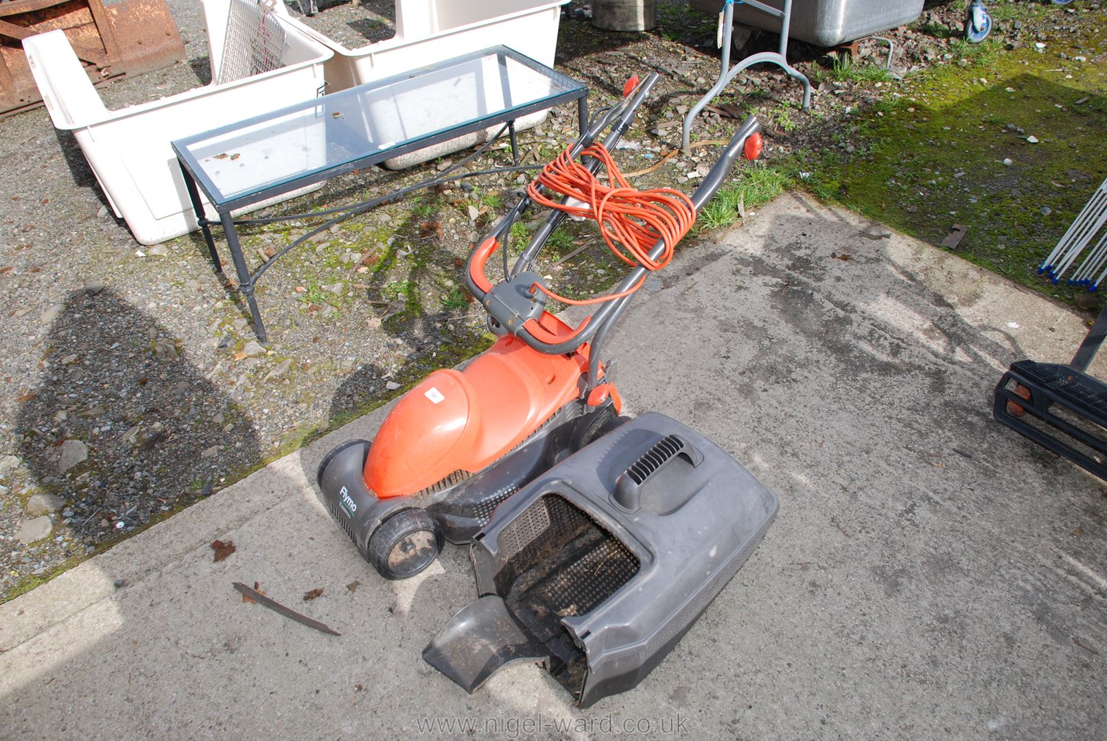 Small electric Flymo Easimo lawn mower and box