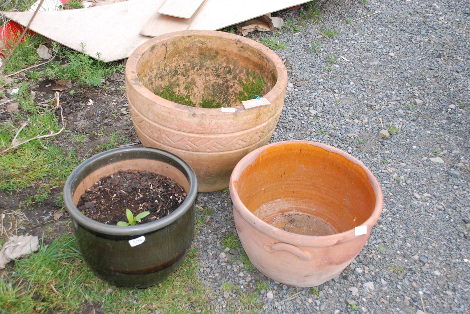 Three garden planters, largest 15'' high x 19'' diameter, one a/f.