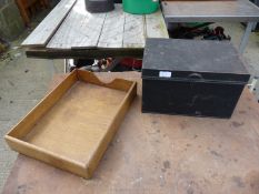 A metal deeds box and wooden stationary tray.