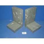 A pair of marble bookends, 7 1/2'' tall.