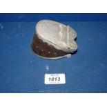 A trinket box made from a Donkey hoof, lined in velvet and with white metal hinged lid,