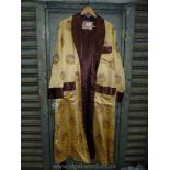 Am oriental Dressing Gown in brown and gold with circular panels of embroidered dragons,