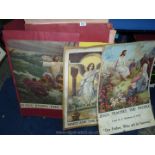 A box containing religious prints, stuck on to card.
