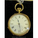 A lady's gold Fob Watch the scroll-work and floral engraved case marked within DB, 18K.